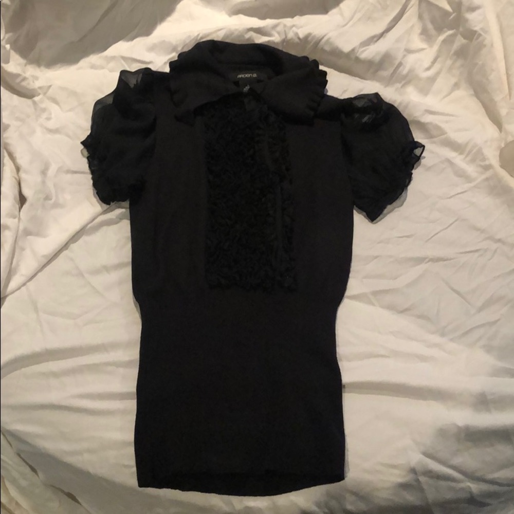 Elegant black sweater with ruffle detailing!